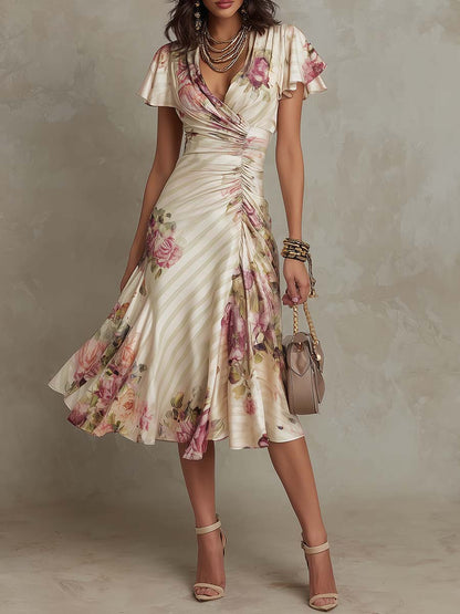 Alba | Elegante vestido midi cruzado con fruncidos y estampado floral