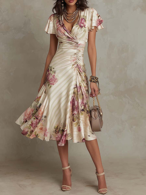 Alba | Elegante vestido midi cruzado con fruncidos y estampado floral