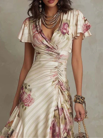 Alba | Elegante vestido midi cruzado con fruncidos y estampado floral